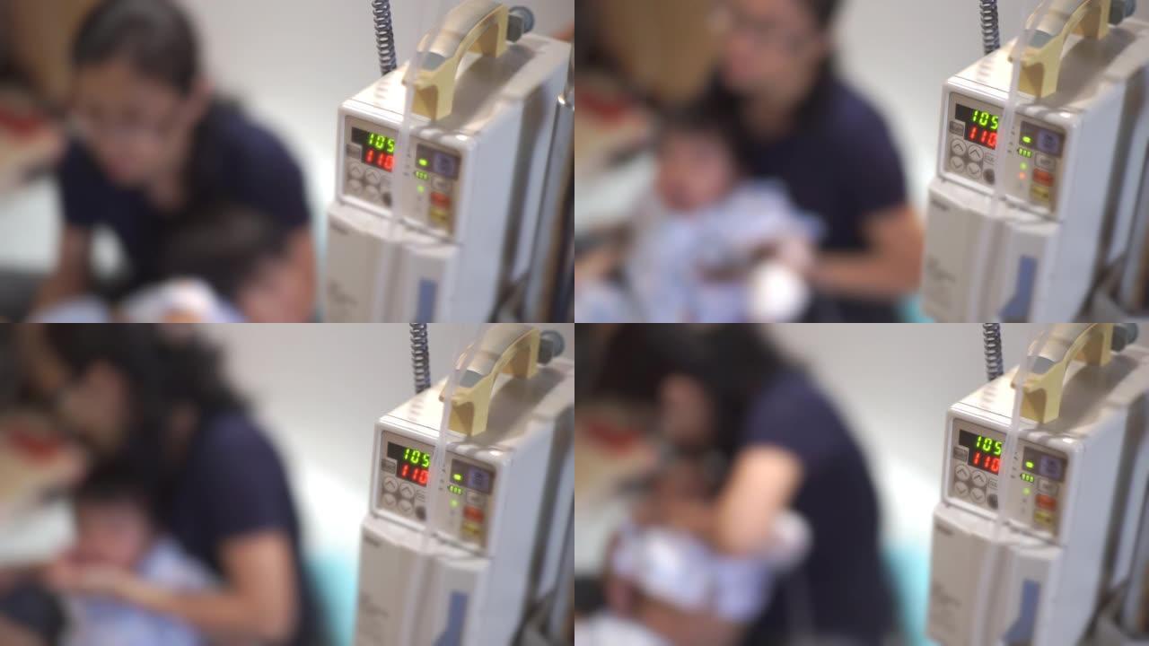 在儿童医院给病人注射静脉滴注时，一个带有液位指示器显示的输液泵特写。
