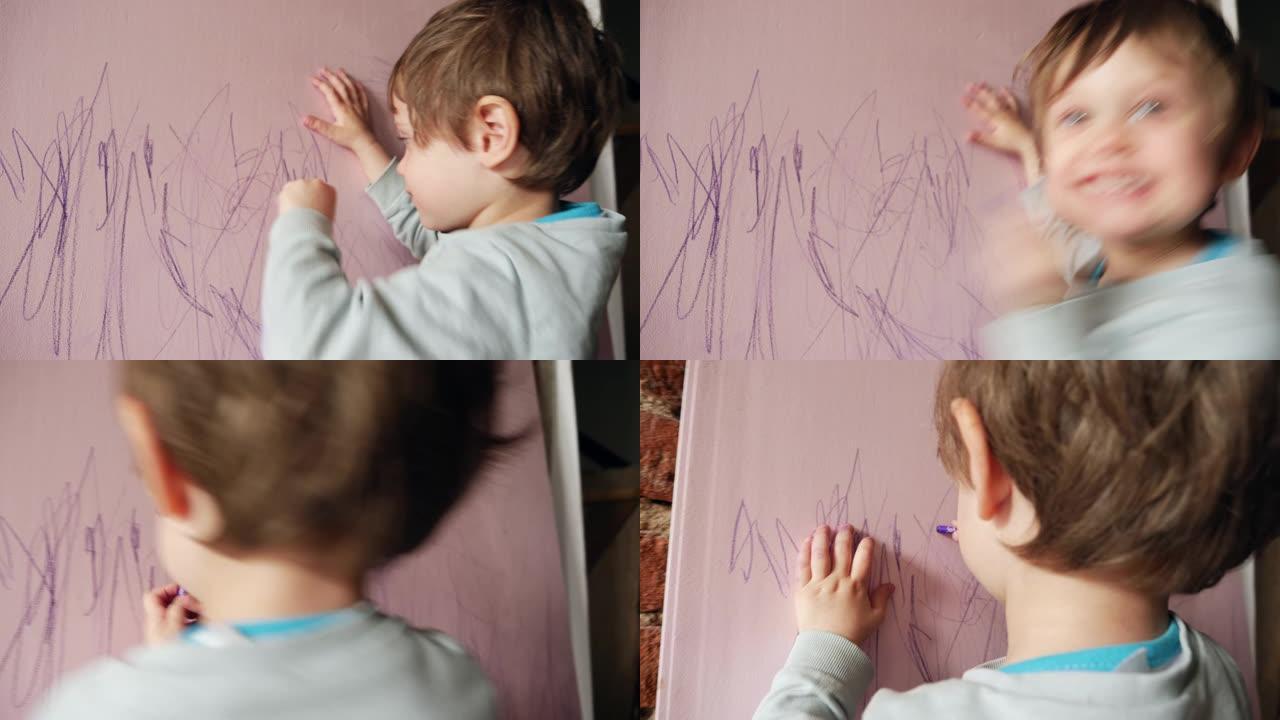 可爱的蹒跚学步的男孩在家里的面板上画画