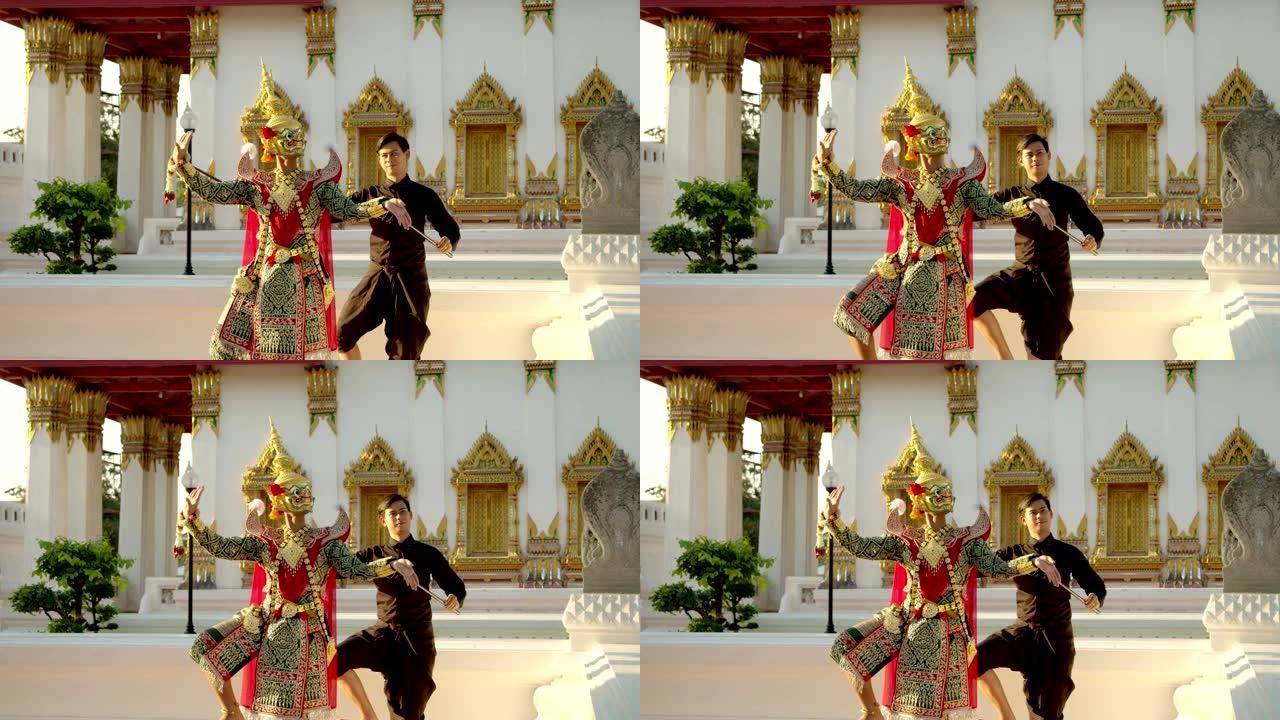 泰国古老的传统舞蹈在名为Khon的面具下。在Ayuthaya province美丽的寺庙中与巨大的面