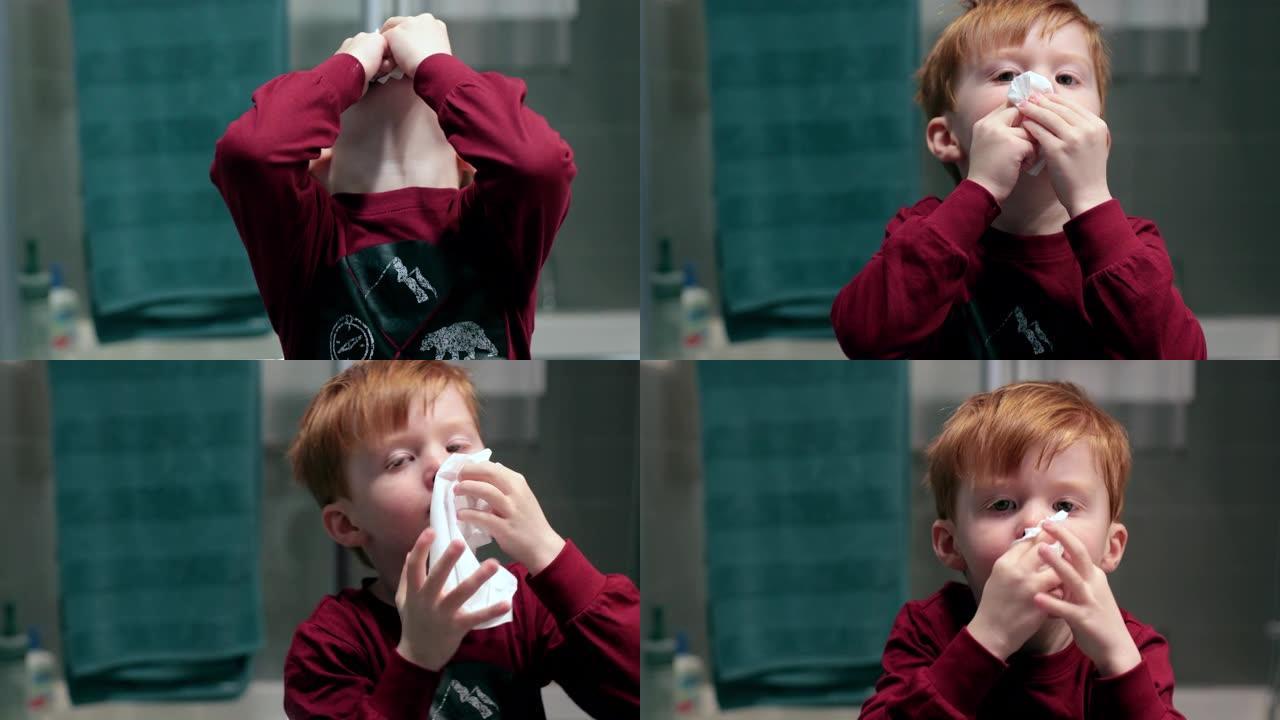 红发小男孩学习如何鼻涕