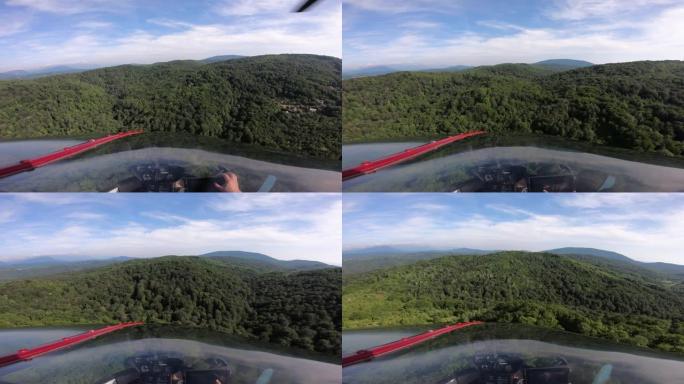 直升机飞越森林和城市