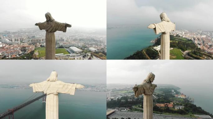 悲伤的耶稣纪念碑张开双臂反对里斯本城