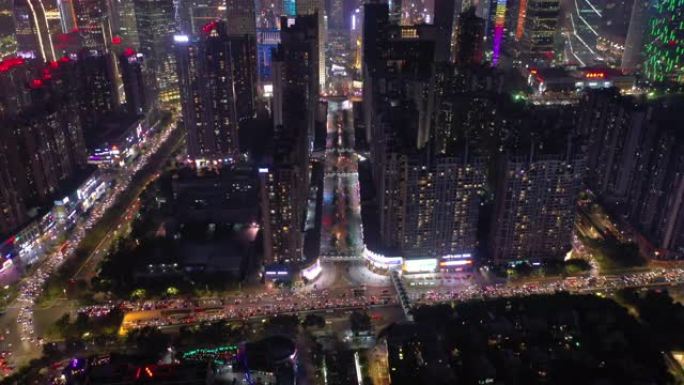 广州市中心夜间照明繁忙交通街道十字路口空中俯拍全景4k中国