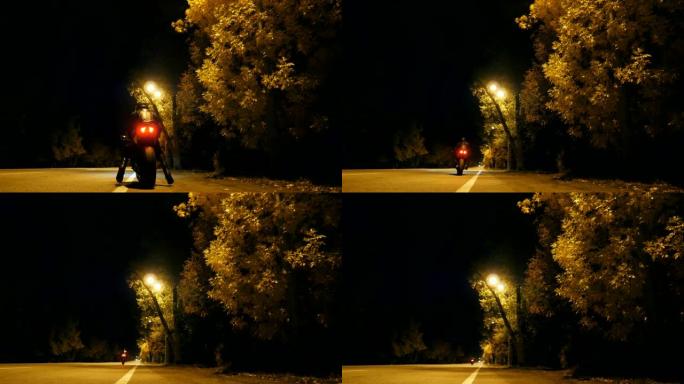 戴着头盔和皮夹克的骑自行车的人在夜间高速公路上坐在摩托车上，开始骑行。男人在晚上开始骑摩托车。自由和