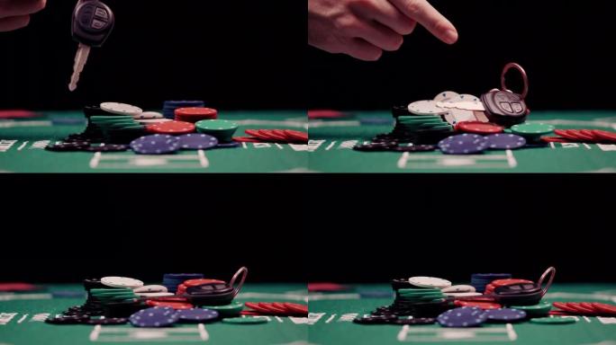 赌徒的特写镜头把他的车停在扑克桌中间的一堆筹码上