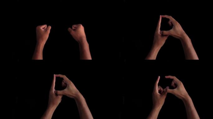 一对男性的双手走上前来，展示英国手语中用于聋哑人的D字母手势。