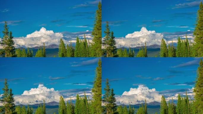 遥远的山脊线夏季春季山峰充满绿色的树叶，深蓝色的天空时间流逝4K