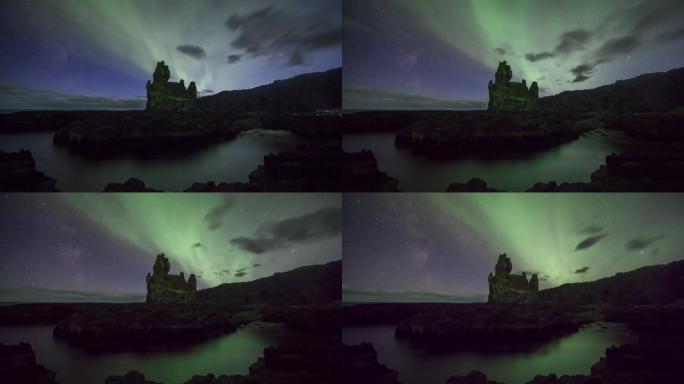 北极光北极光在冰岛的Londrangar岩层上延时