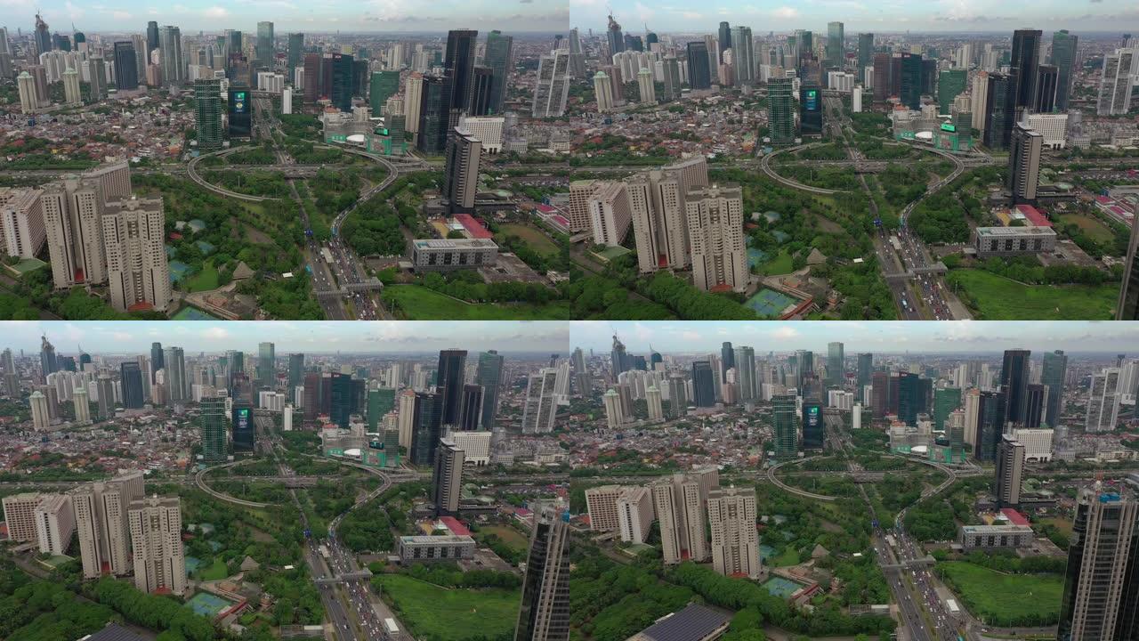 雅加达市区绿色公园交通路口空中全景4k印度尼西亚