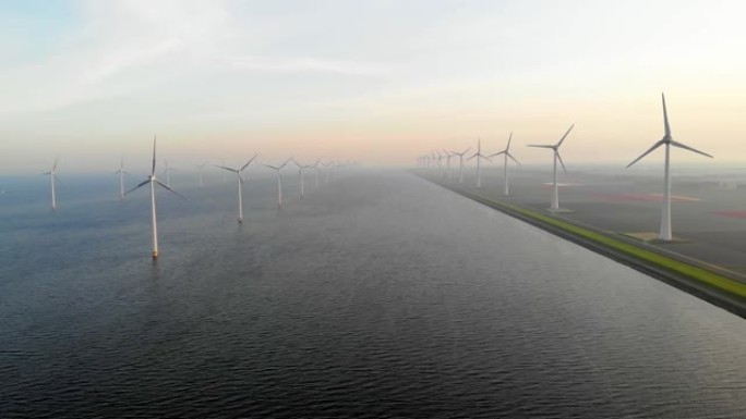 荷兰的风车农场，风车涡轮花卉和在土地上工作的农民，荷兰的绿色能源