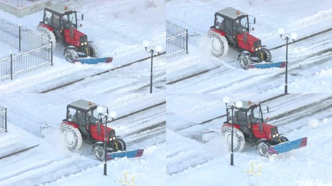 拖拉机清除人行道上的积雪