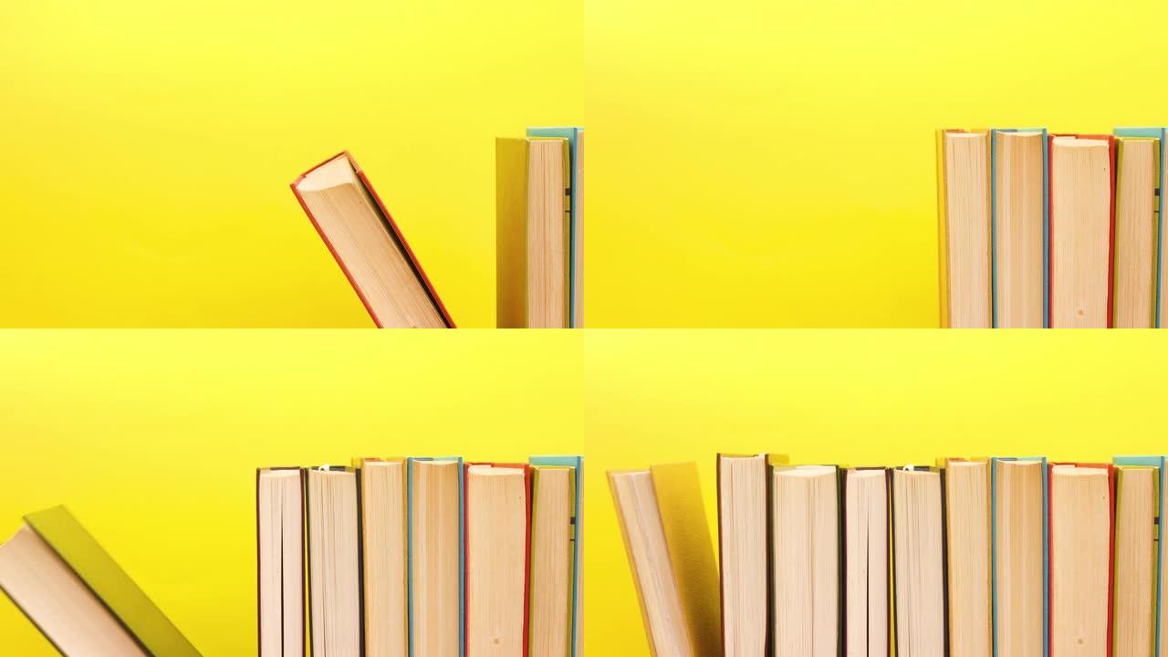 黄色背景下的图书订购-停止运动