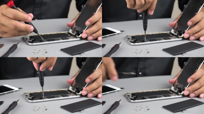 维修损坏的智能手机的技术人员或工程师