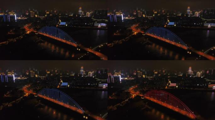 夜间照明武汉市著名交通桥梁河畔航空全景4k倾斜换挡中国