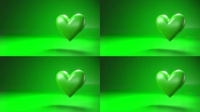 在绿色文本空间上脉动绿色心形对象。