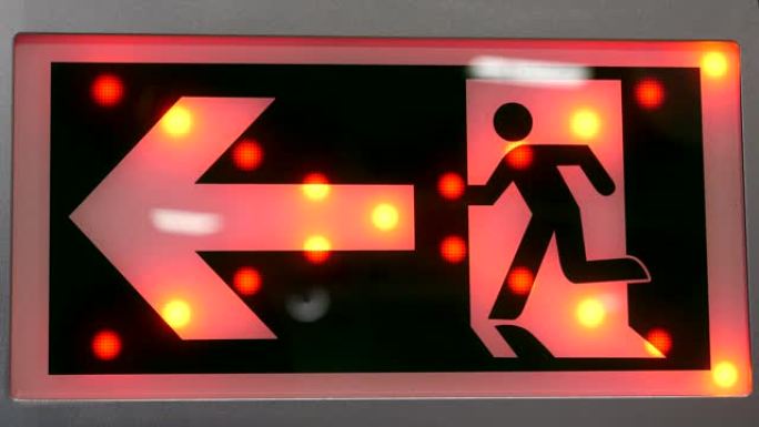 红色箭头和男子标志显示向左方向