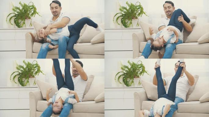 4k视频，父亲抱着女儿玩。