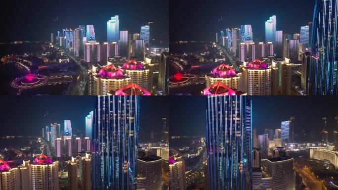 夜间照明秀青岛市著名市中心纪念碑湾空中全景4k中国