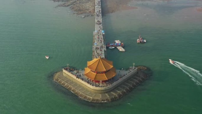 日落时间青岛市著名海滩海湾宝塔码头空中俯拍全景4k中国