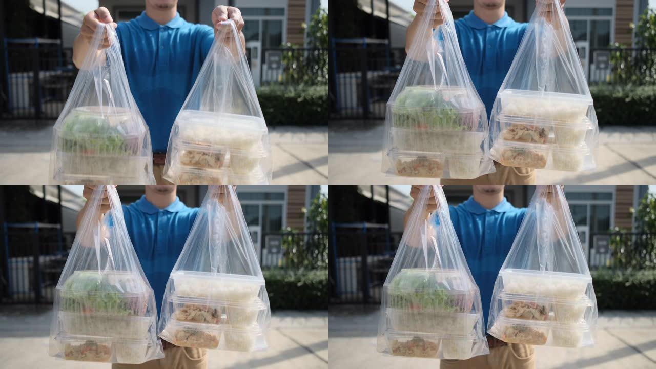 送货员把塑料袋从超市网上购物到女客户服务客户前台，快递杂货店冠状病毒covid19新的正常生活方式。