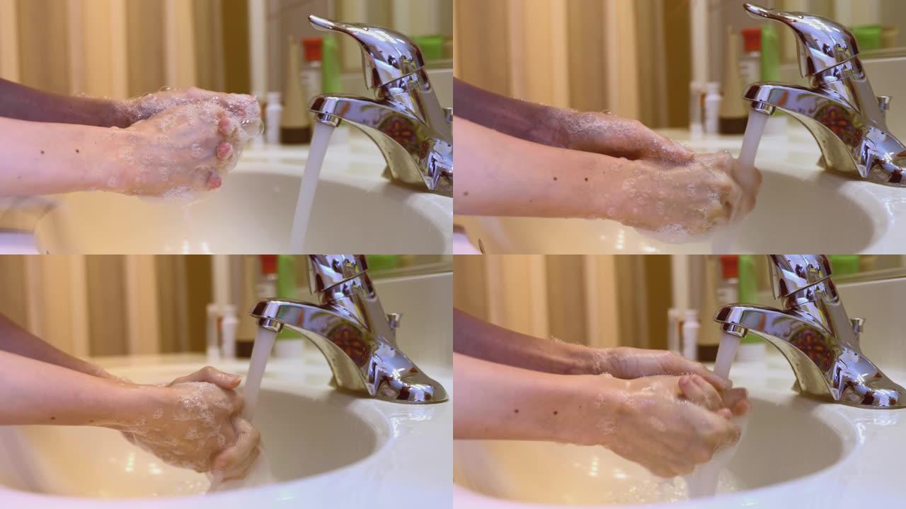 用消毒擦拭的浴室中年轻女子的手部清洁表面的特写镜头。