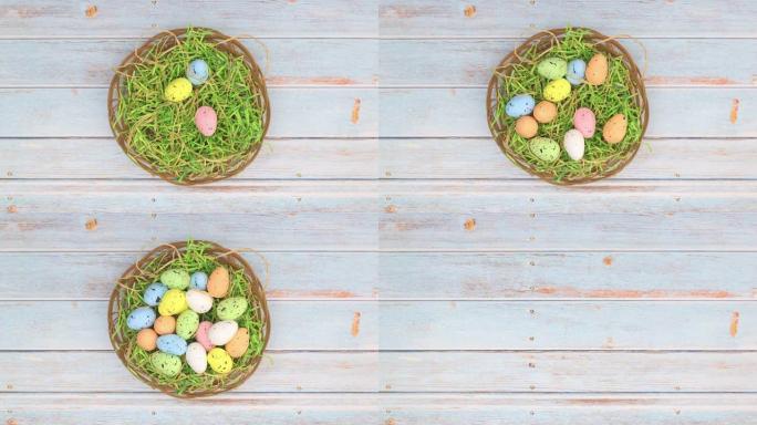 柔和颜色的复活节彩蛋出现在木篮中，用于装饰-停止运动