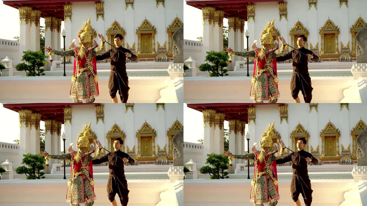 泰国古老的传统舞蹈在名为Khon的面具下。在Ayuthaya province美丽的寺庙中与巨大的面