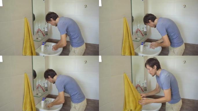 一名男子小心地用液体肥皂洗手，这有助于他抵抗新型冠状病毒肺炎感染。手卫生概念。自我隔离概念
