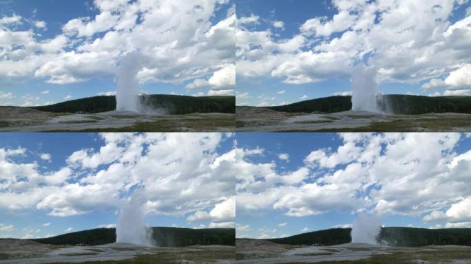 怀俄明州黄石国家公园爆发时，老忠实间歇泉释放蒸汽和水的壮丽景色
