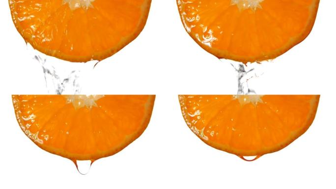 橙色切片果汁水在白色背景上慢动作飞溅