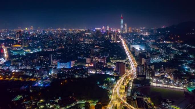 台北城市景观夜间照明交通路口屋顶空中全景4k延时台湾