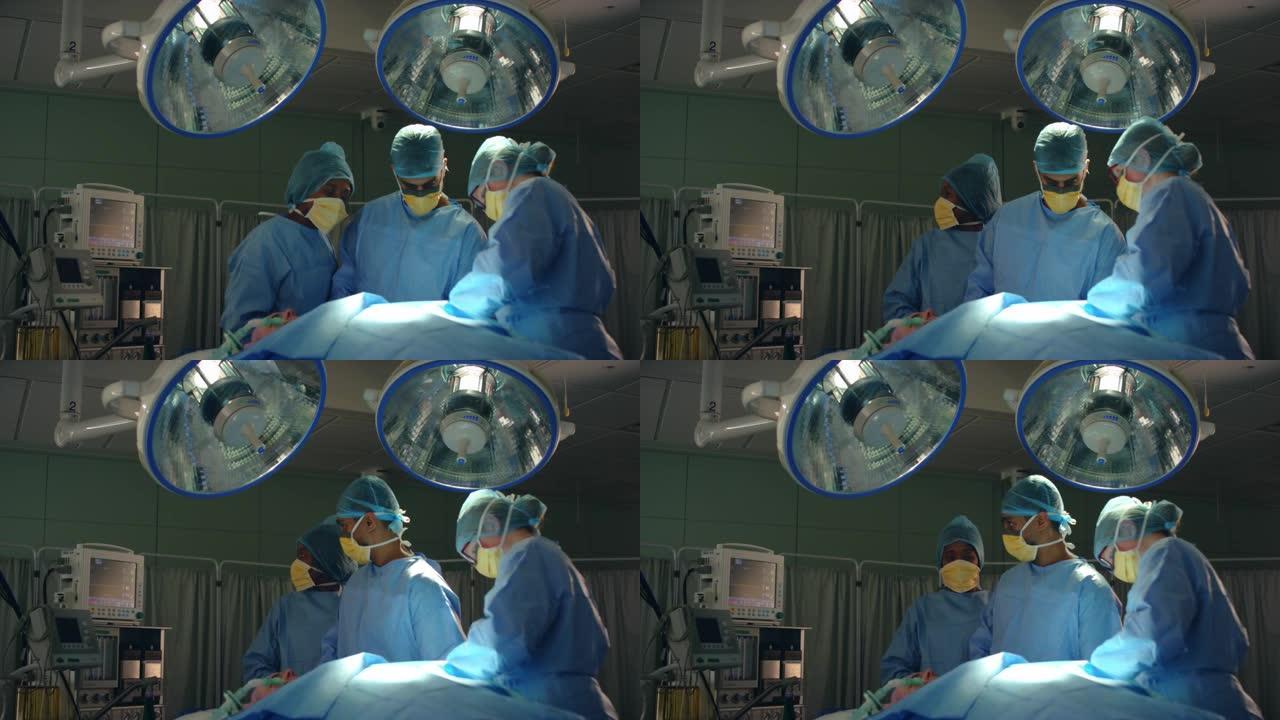 医务人员在手术过程中检查监视器