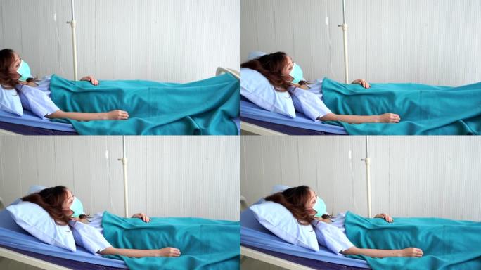 女性患者冠状病毒躺在检疫的床上