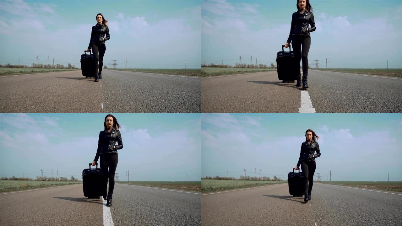户外活动旅行概念女人在沥青路面上带包。前视图