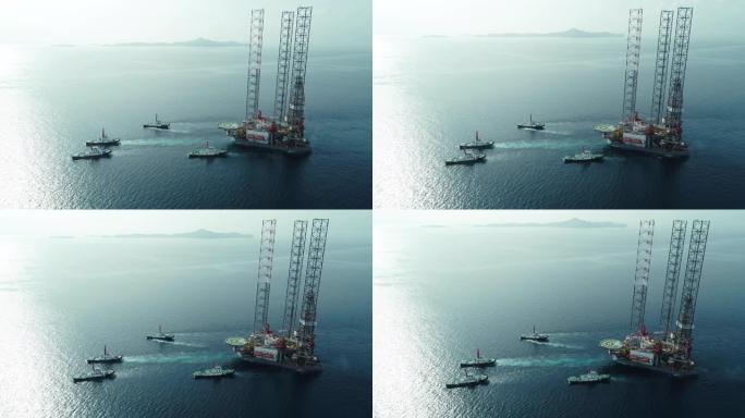 空中俯视图拖船从炼油厂大桥拖运油轮，用于海上运输库存视频