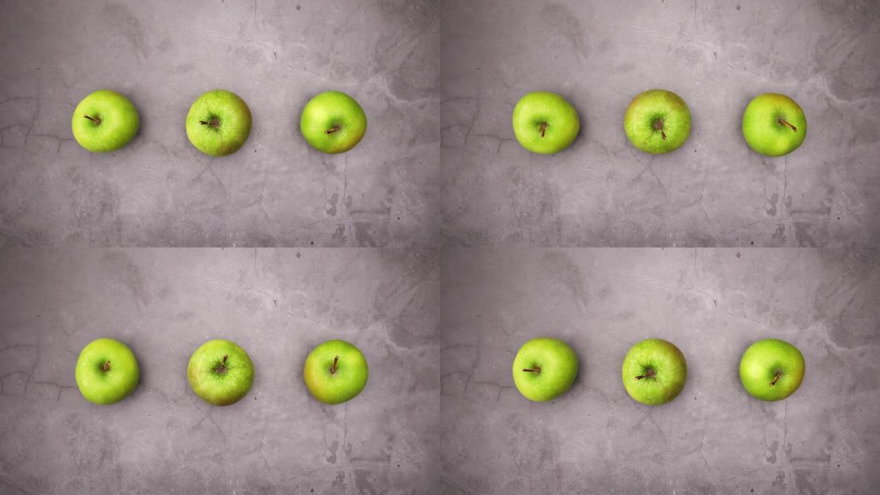 三个有机新鲜青苹果绕圈运动 -- 停止运动