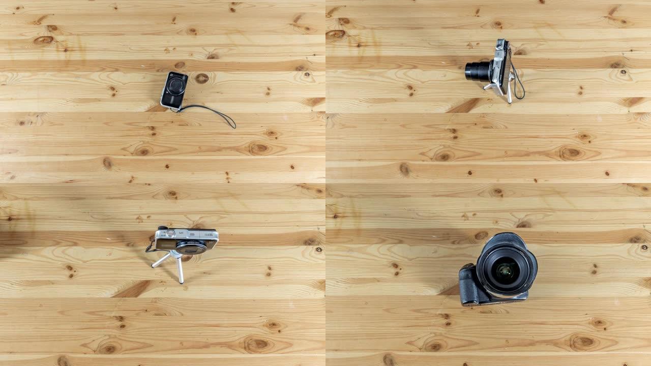 数码相机在木制桌子上的小三脚架上移动，延时停止运动