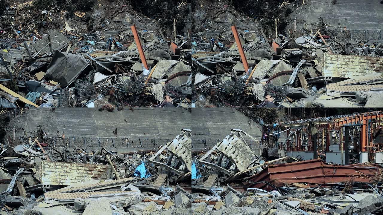 日本福岛-03/11/2011: 海啸过后，城市被毁，房屋废墟无处不在