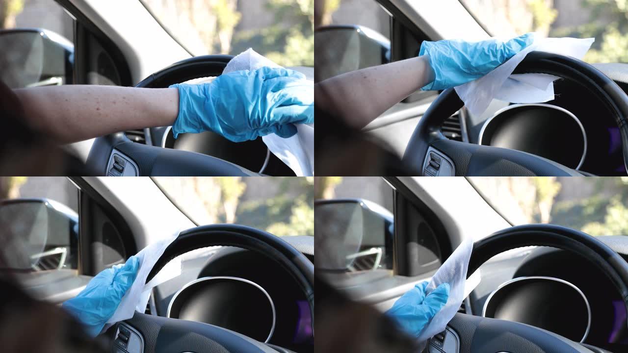 一个女人用湿巾清洁汽车方向盘的4k视频