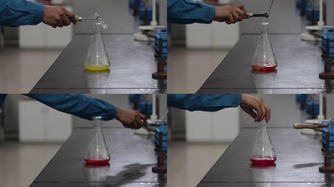 在化学实验室的试管中添加白色化学物质后，圆锥形烧瓶中黄色化学物质的颜色会发生变化。