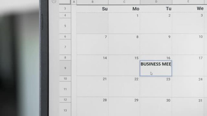 在日历上的16日写商务会议以记住这个日期。