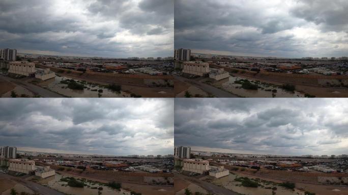 马斯喀特路后冠状病毒电影时光流逝的建筑和院子的公司与美丽的云和天空在白天高角度阿扎伊巴马斯喀特阿曼城