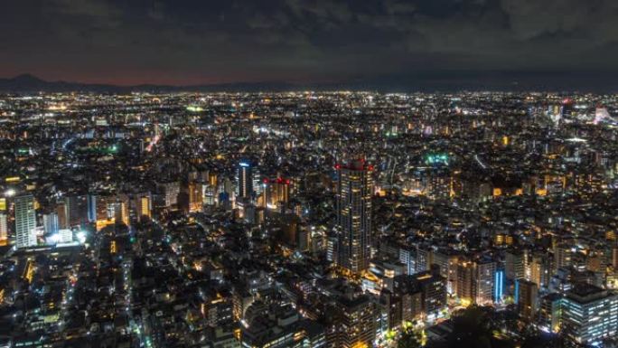 4k延时: 缩小摩天大楼的视野，以及日本东京富士山背景下市中心的繁忙交通