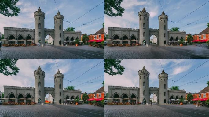 波茨坦的瑙恩门 (Nauen Gate)，有过往的电车和人-时间流逝
