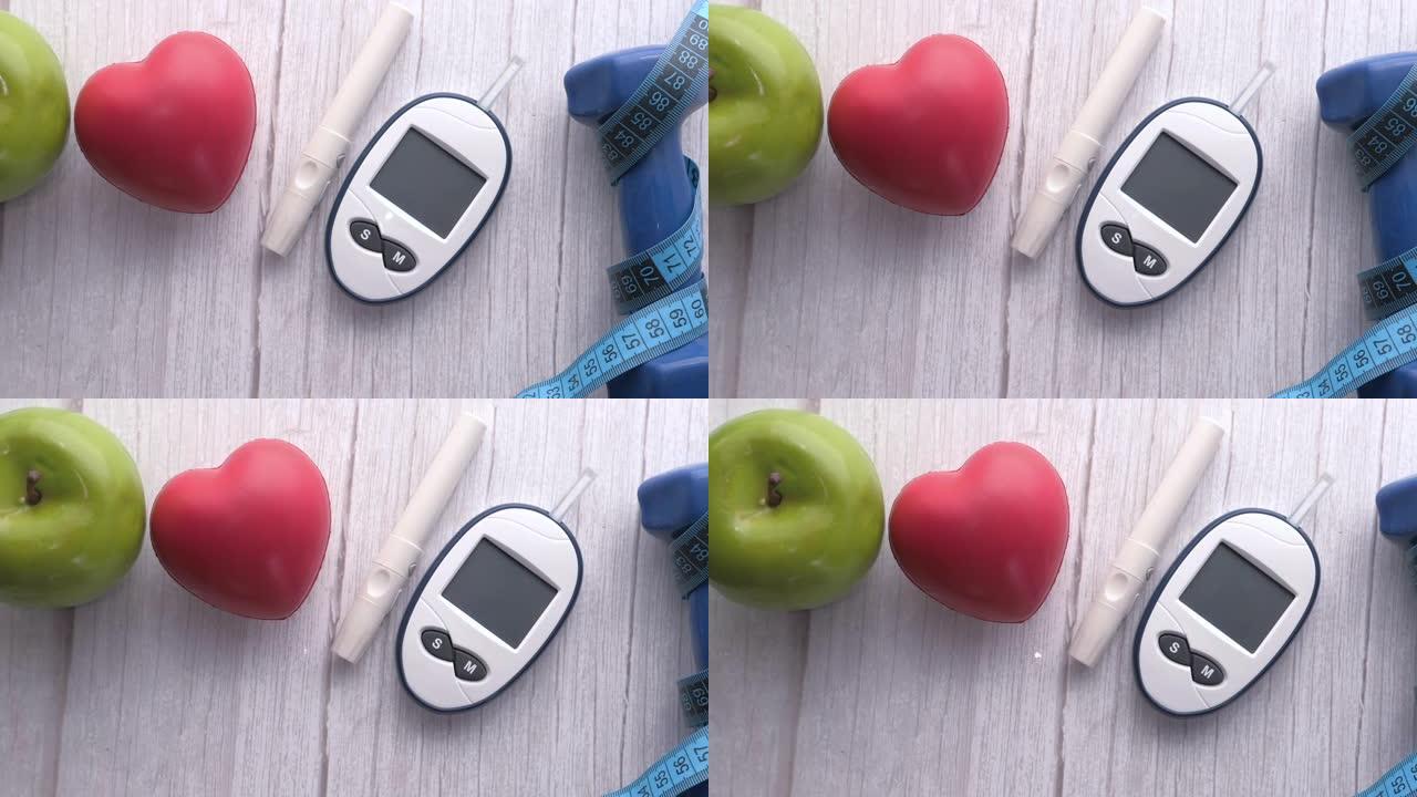 用苹果和哑铃测量糖尿病的血糖