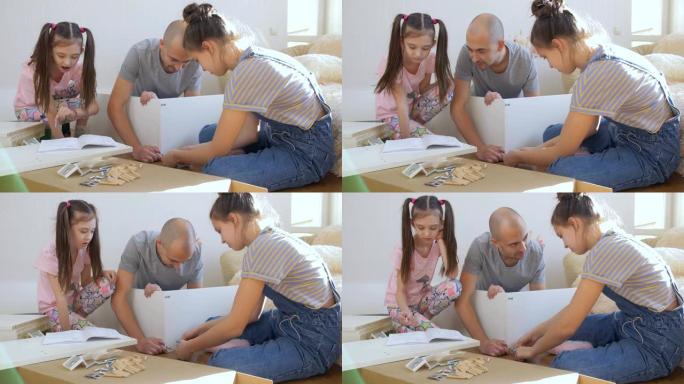 两个十几岁的姐妹帮助他们的父亲为孩子们的房间整理了一个新的架子。