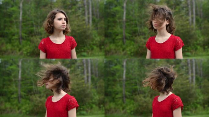 女孩把头转向风吹着头发
