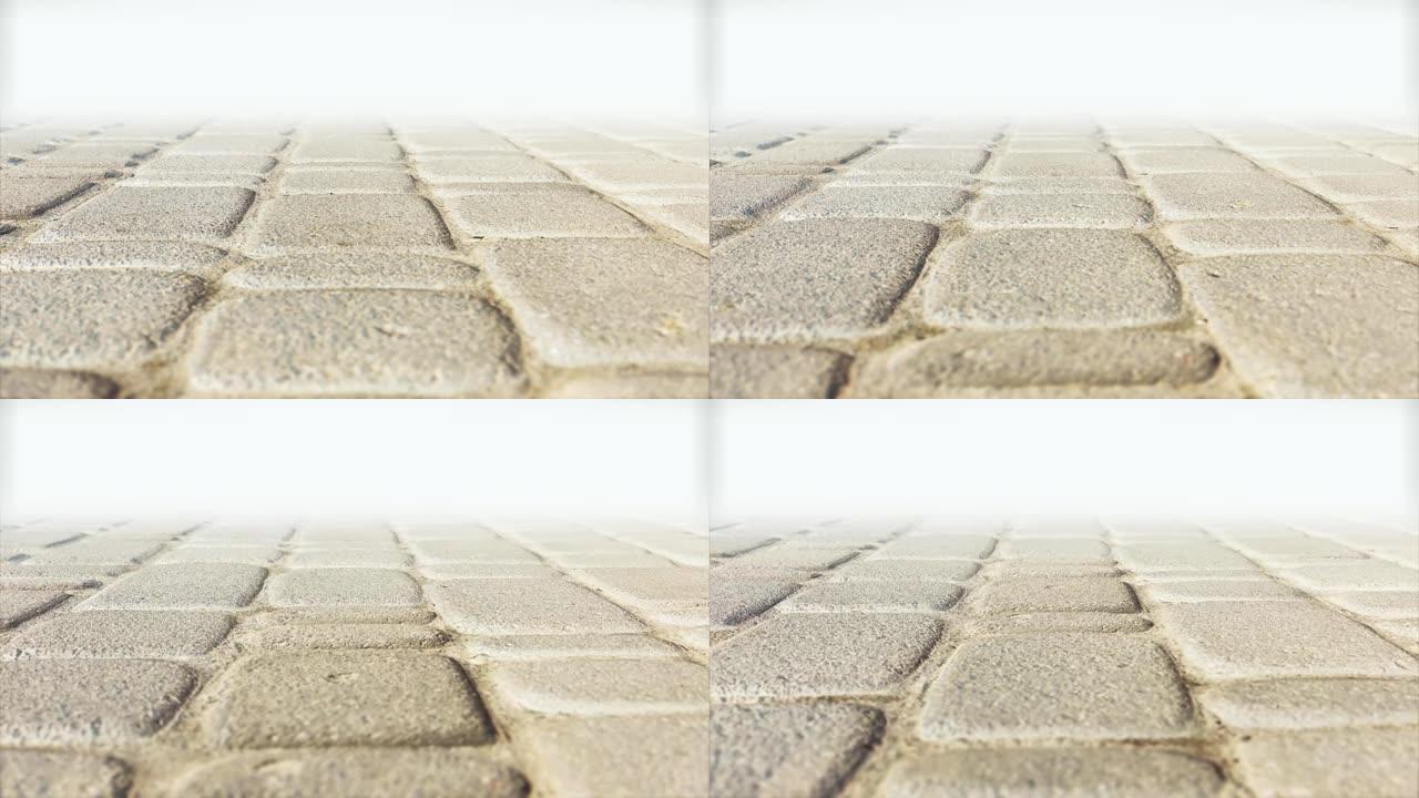 在外部铺路石上缓慢行走，具有模糊效果和特写镜头。地砖的3D无缝循环动画。