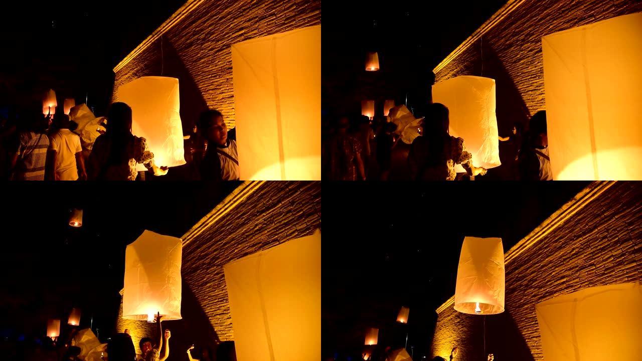 洛伊·克拉通节。身份不明的男人和女人每年都会在泰国Lamphun点燃纸制的漂浮气球。