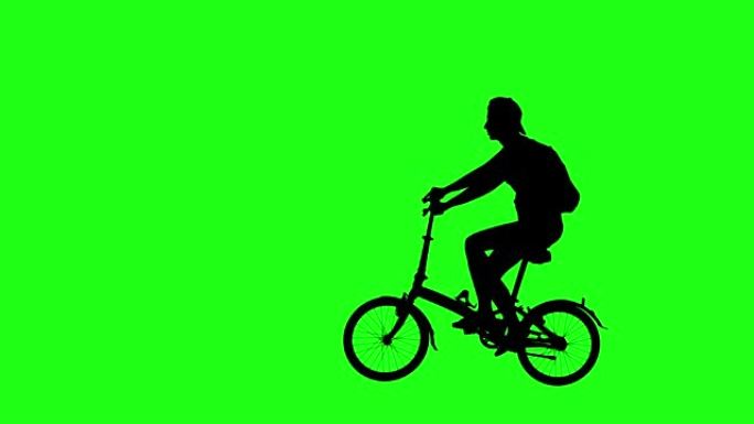 骑自行车的人从右向左穿过屏幕。绿屏镜头。4k动画。